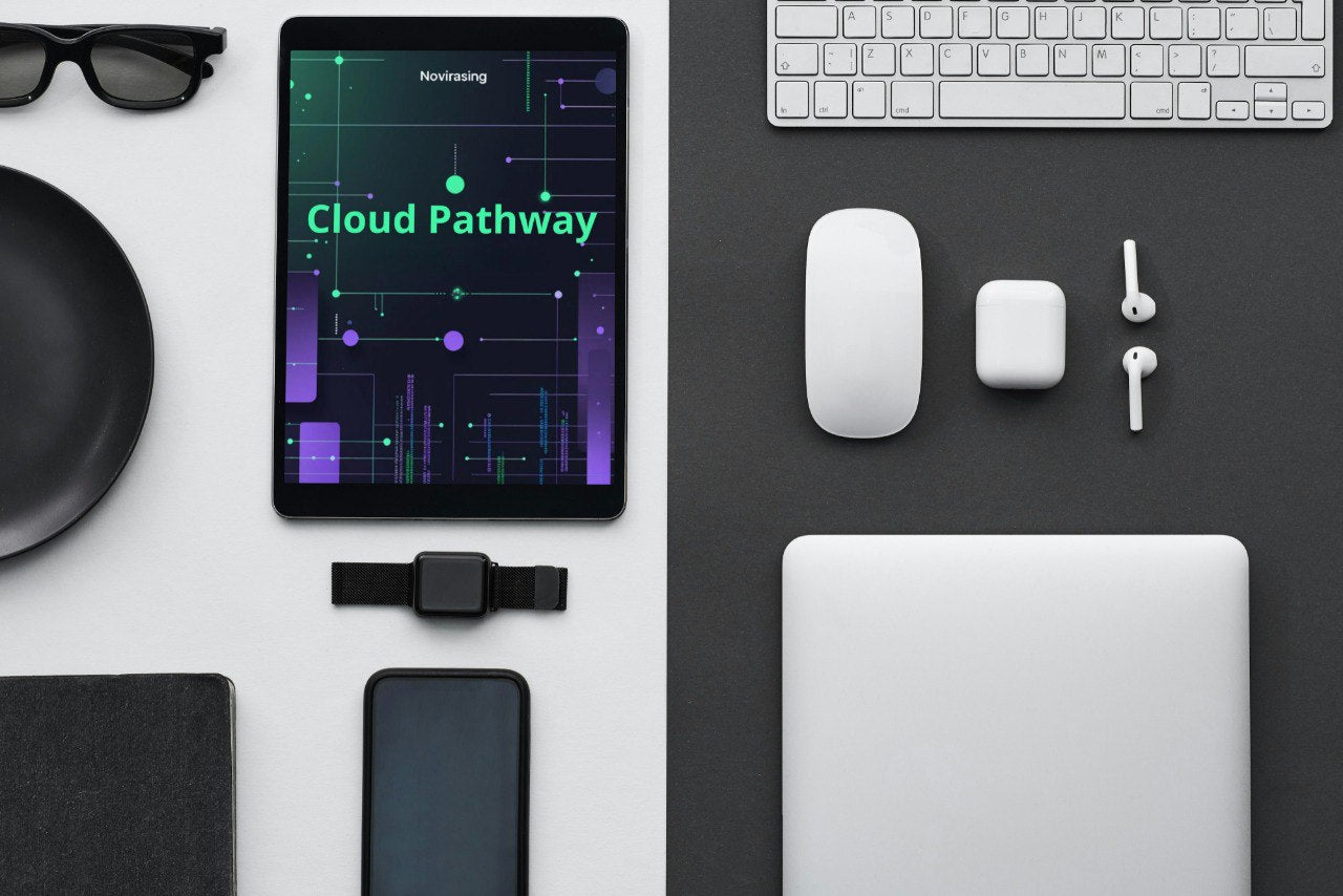 Tablet displaying 'Cloud Pathway' on a desk with keyboard, mouse, and other items.